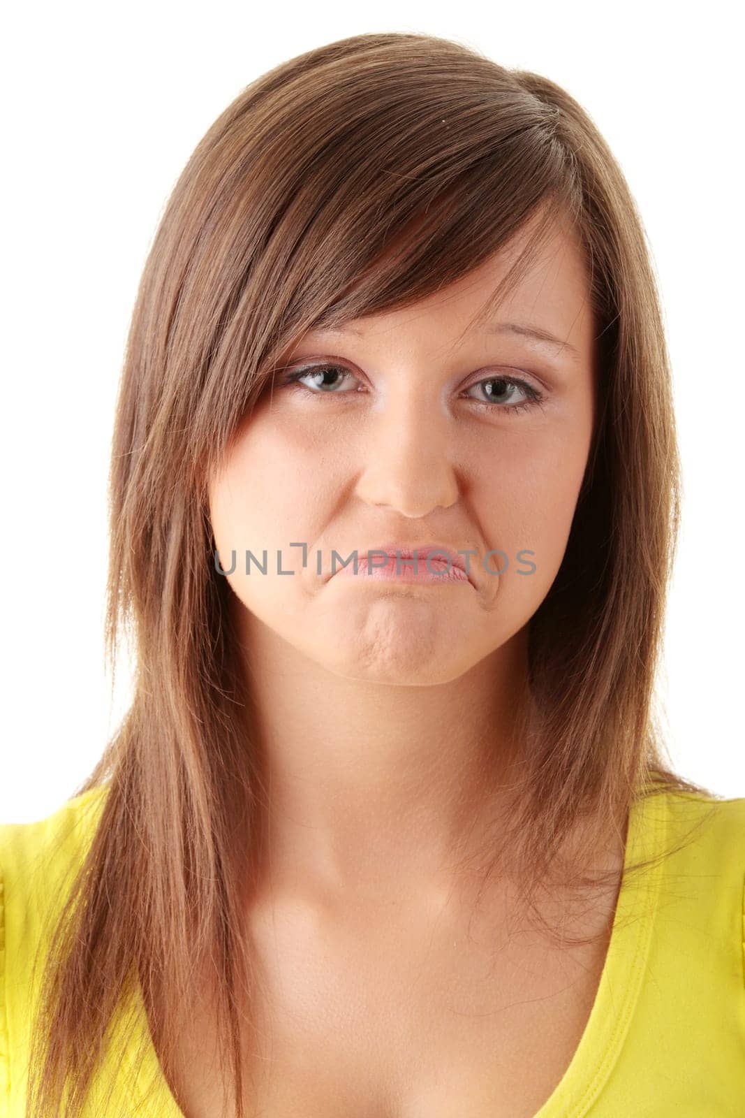 Portrait of young sad woman isolated on white background