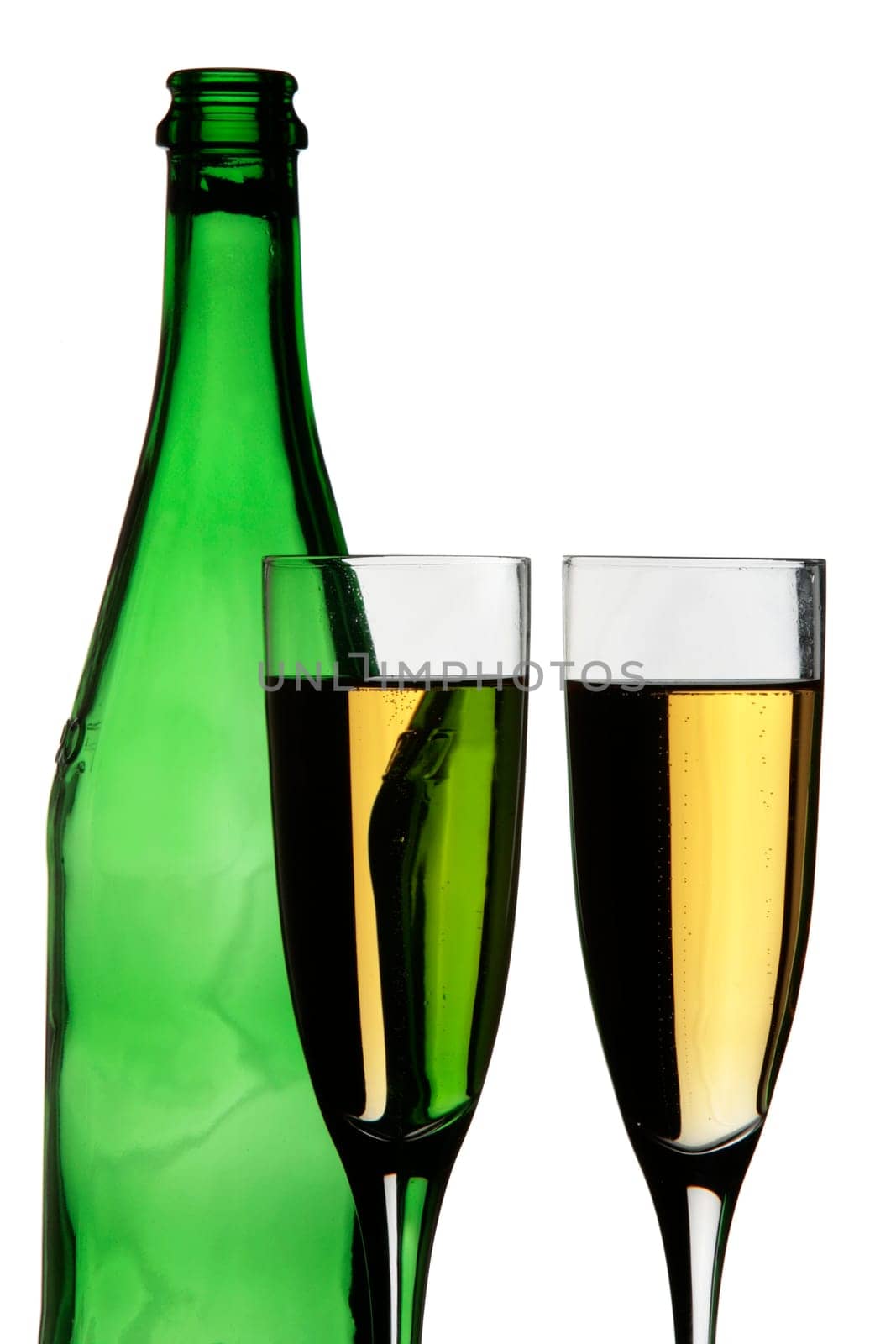 Two champagne glasses and a bottle in silhouette