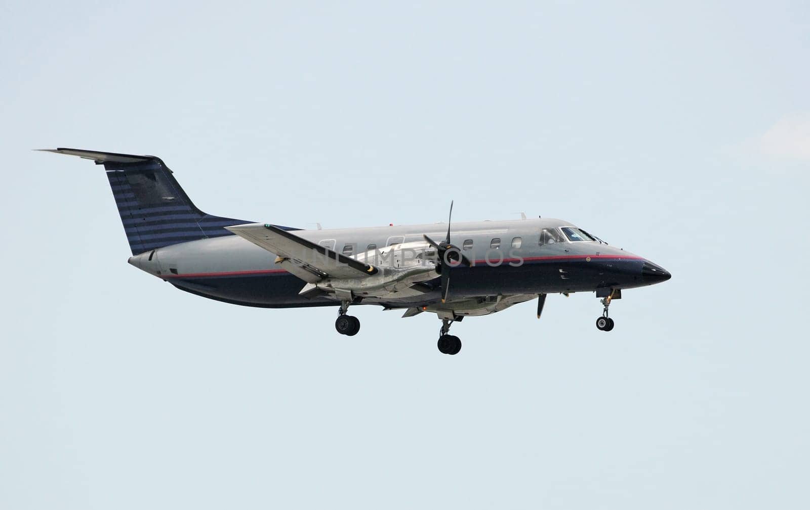 Turboprop airplane in flight side view