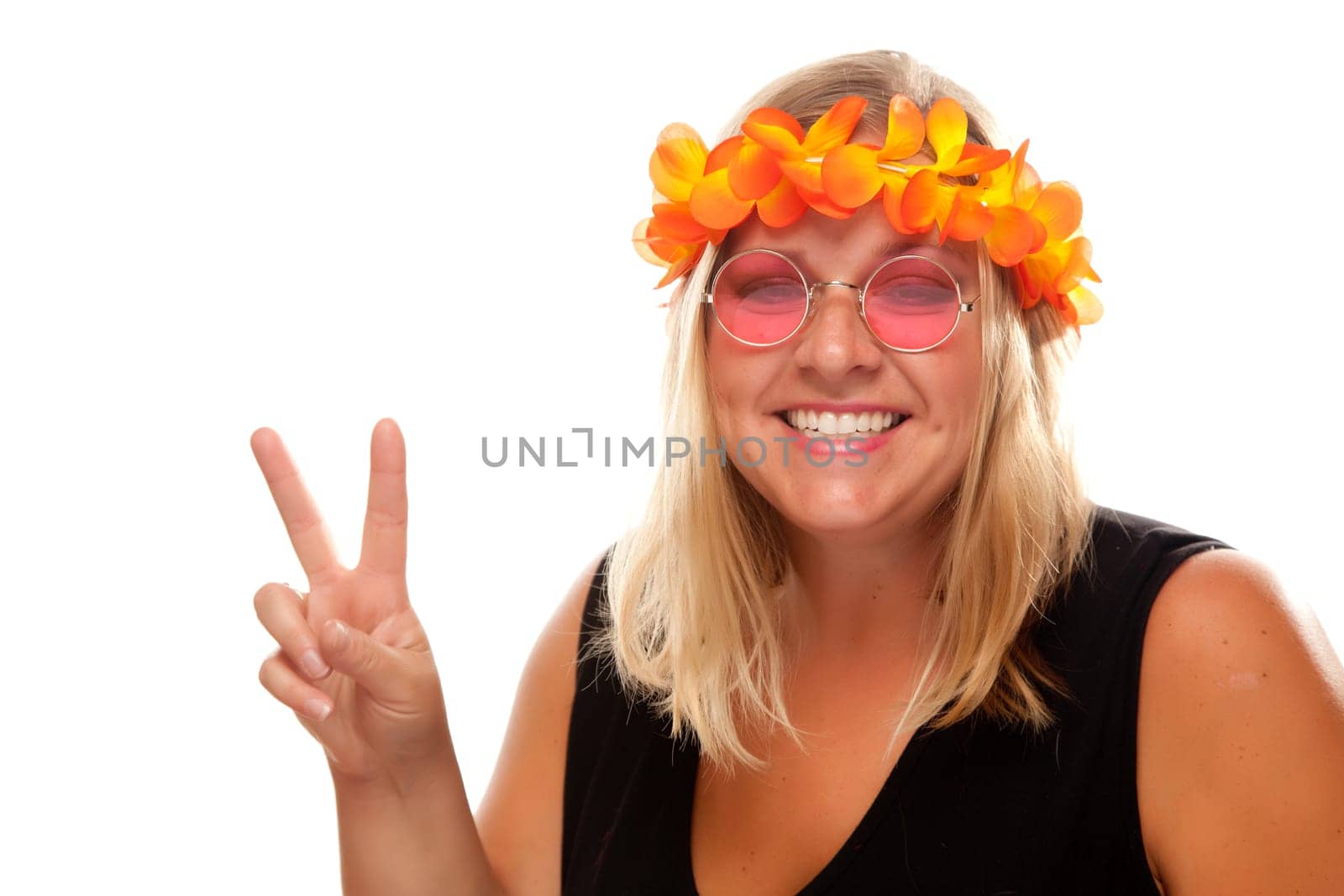 Beautiful Smiling Hippie Girl with Peace Sign Isolated on a White Background.