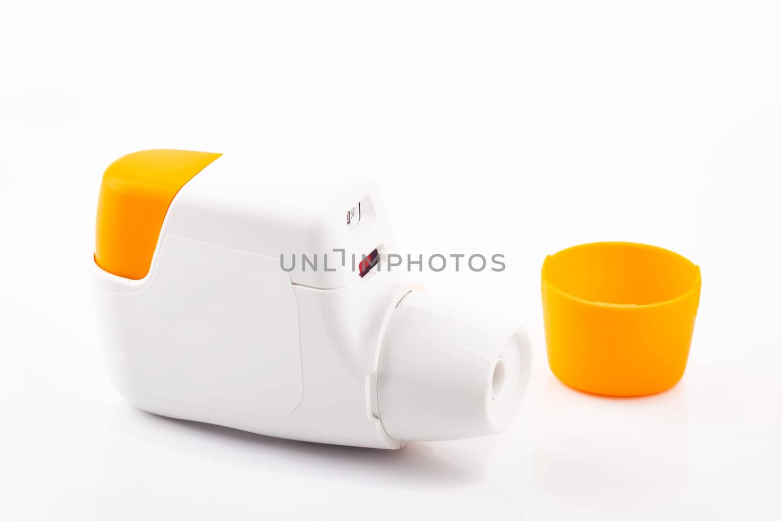 Metered Dose Inhaler isolated over white background