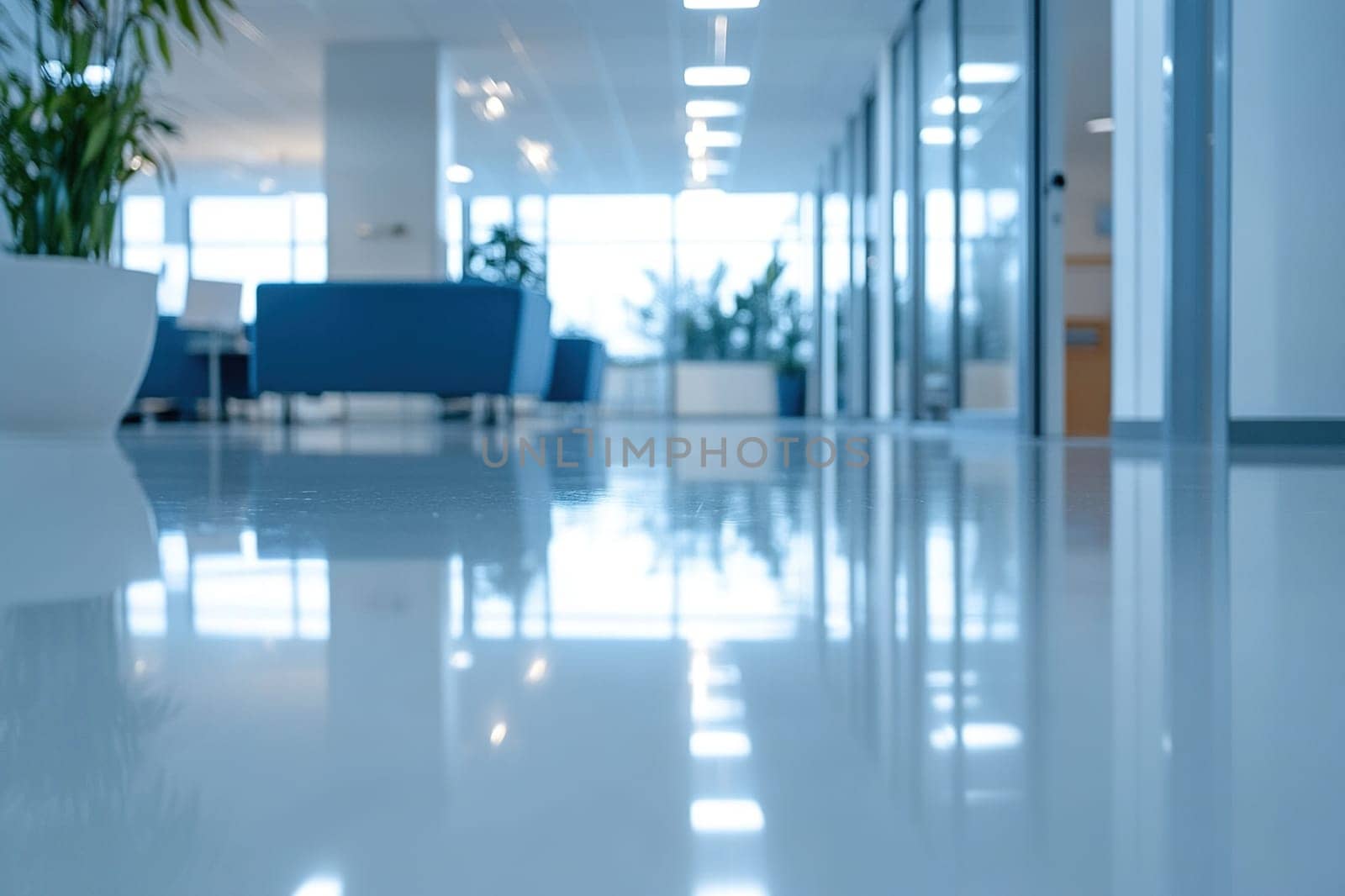 Simple and stylish office environment, bright space with clean shiny floor and blur effect.