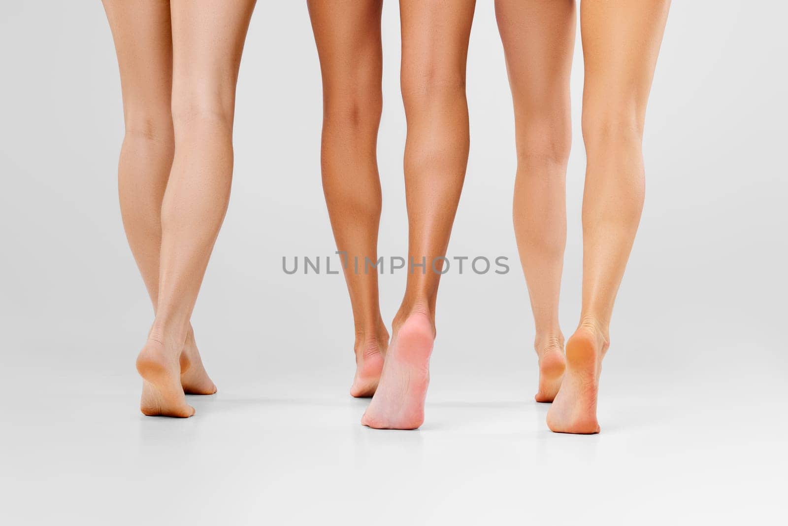 Multi-ethnic beauty concept. Beautiful asian, caucasian and african models with different types of skin.