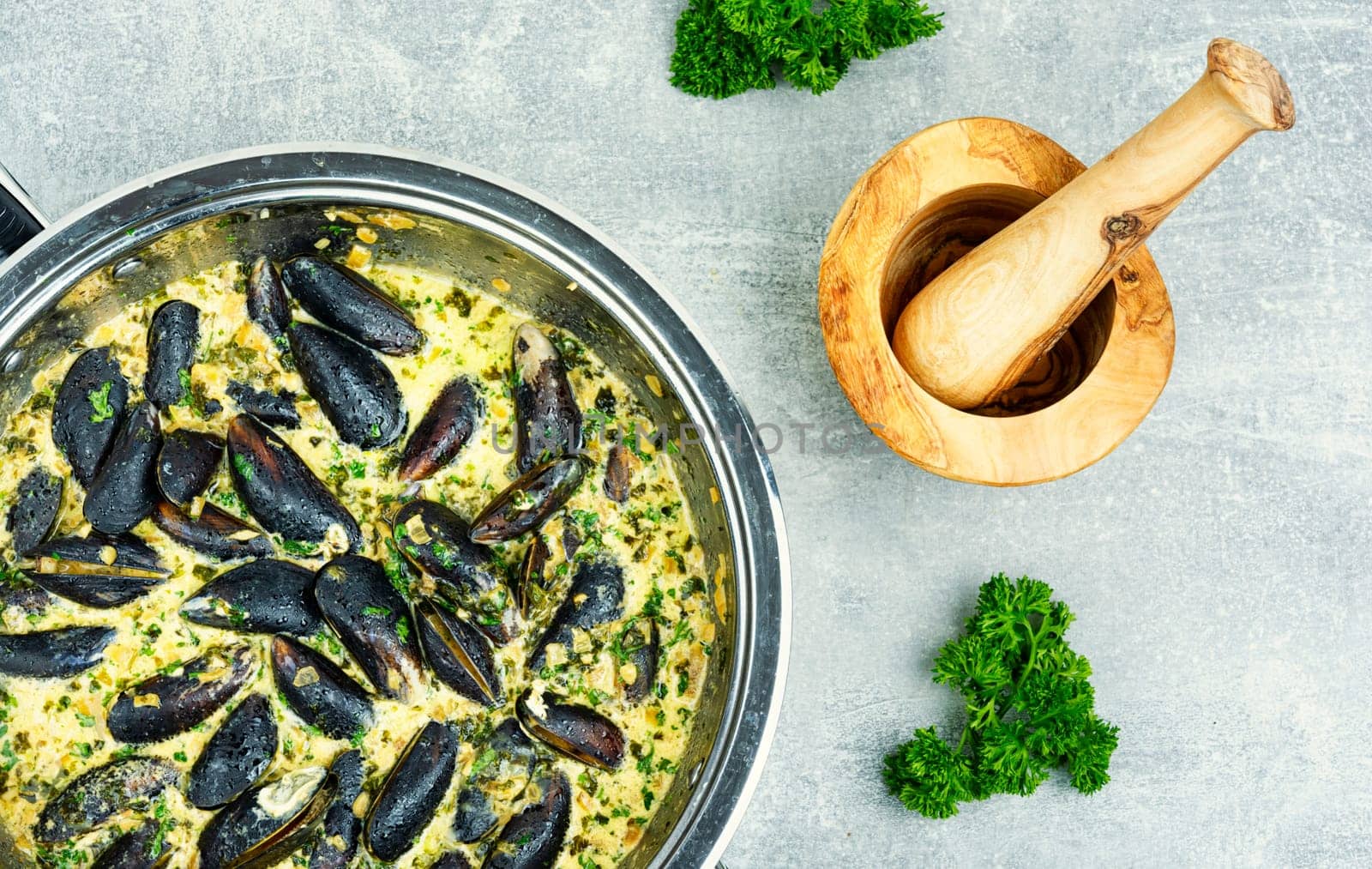 Cooked appetizing mussels in a creamy sauce