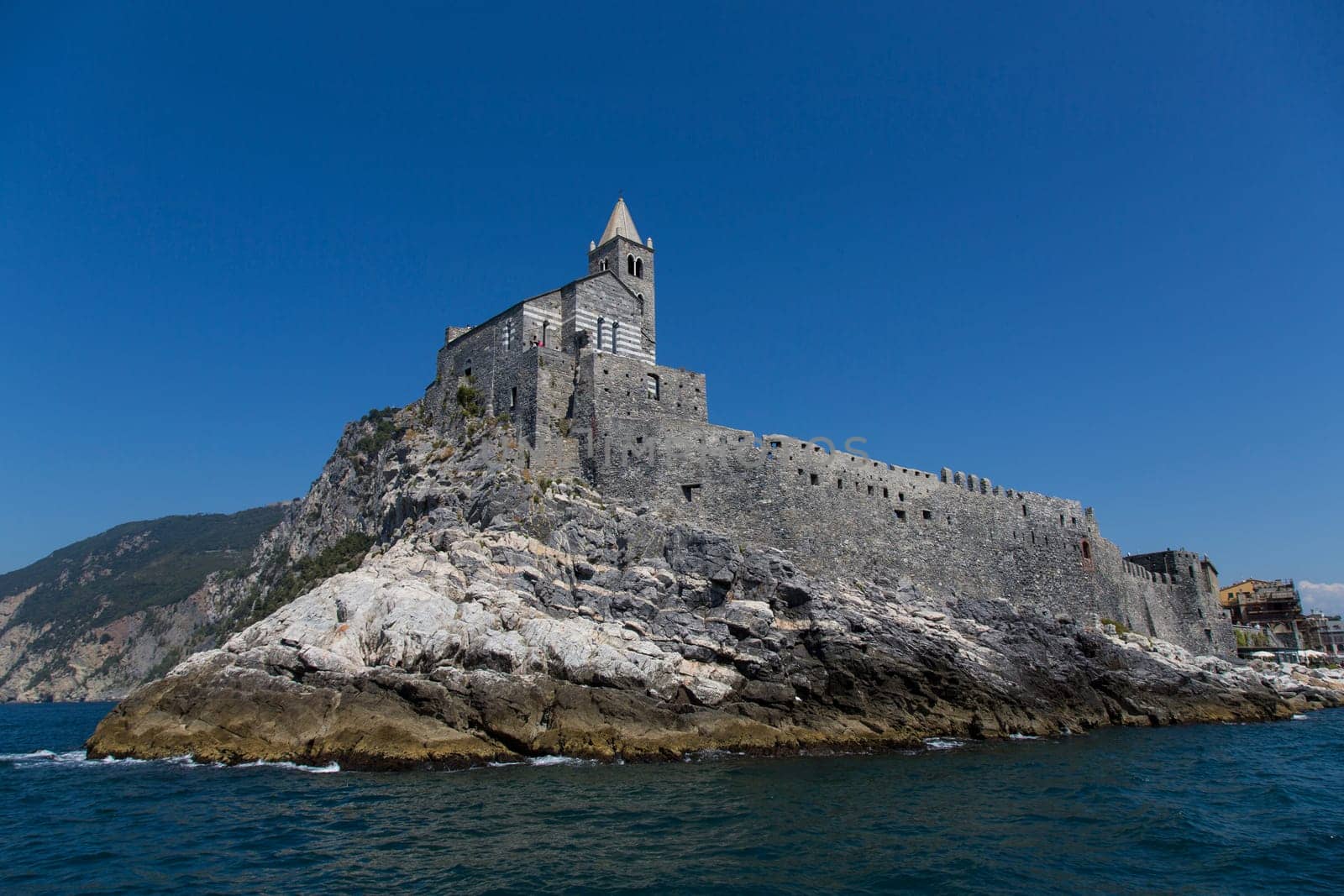 View of a church overlooking the sea in a tourist resort