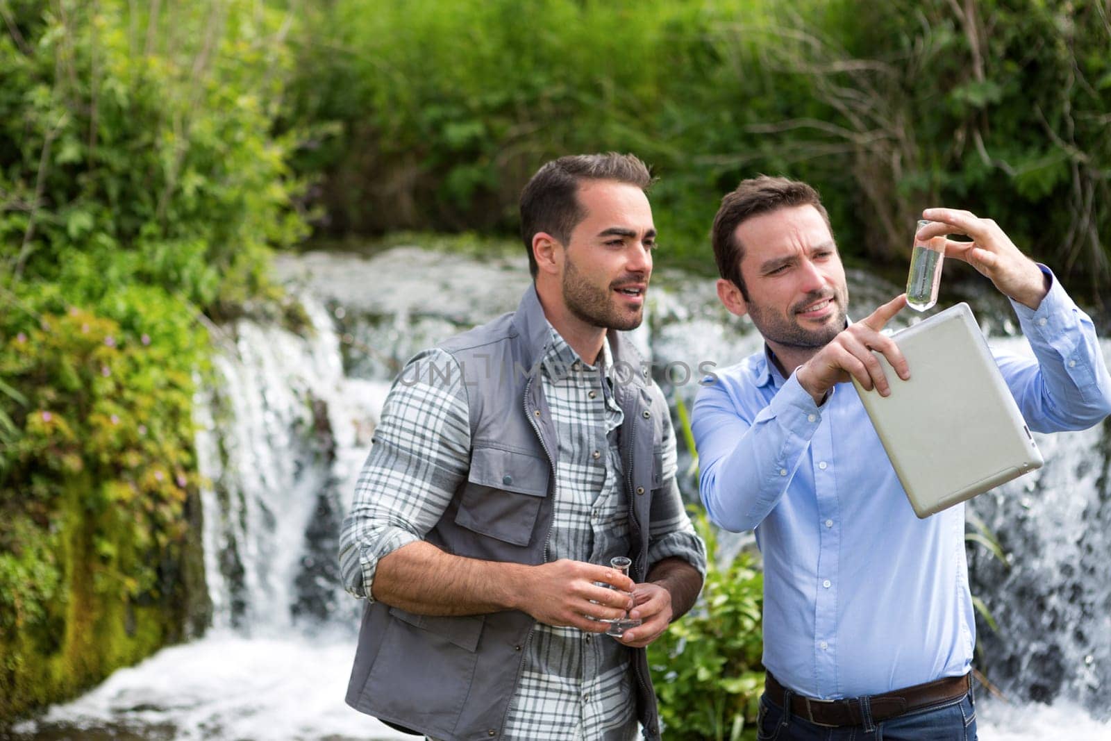 View of a Scientist and biologist working together on water analysis