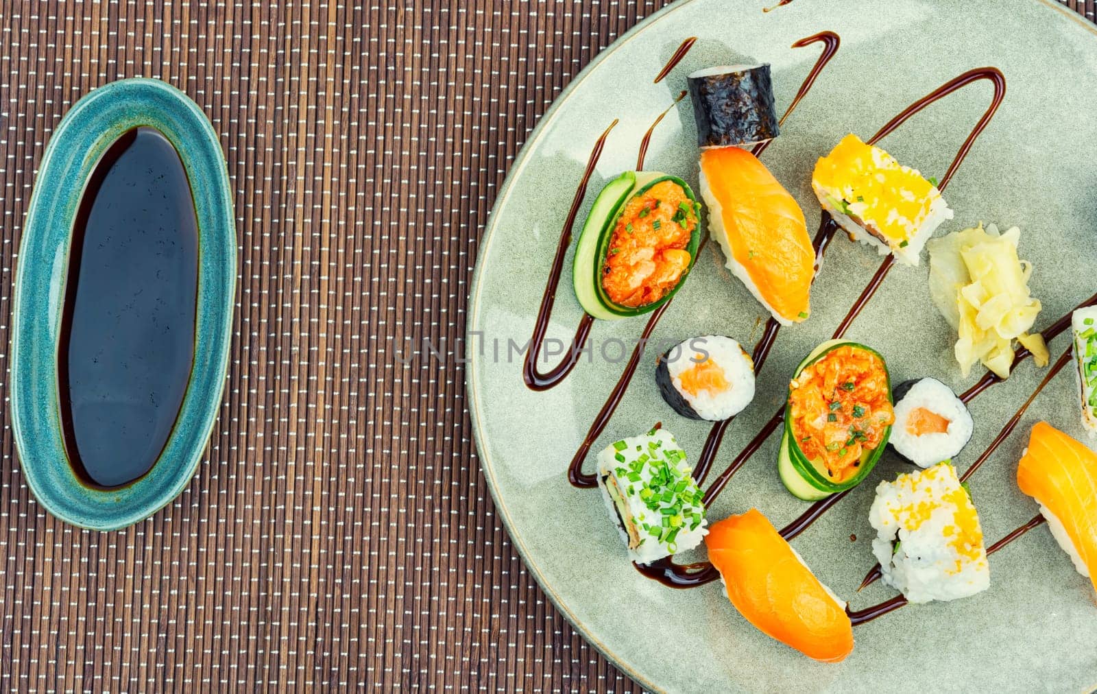 Delicious sushi rolls on the plate. Sushi menu. Japanese food.
