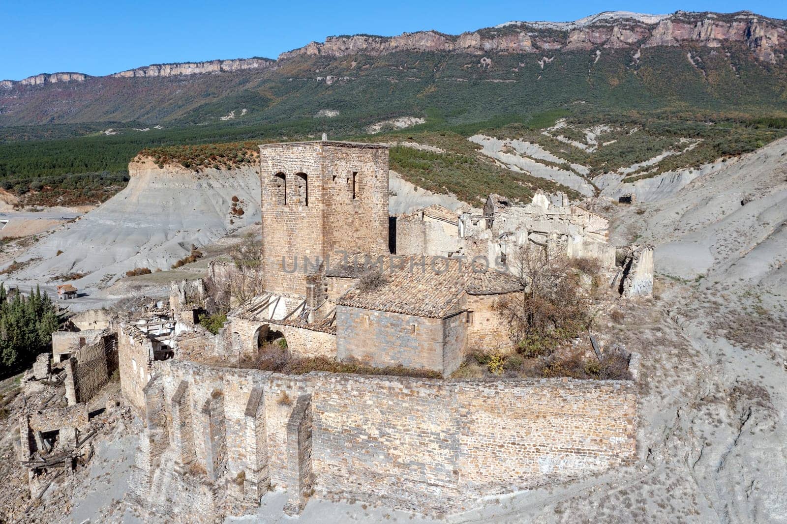 remains of the Romanesque church of San Miguel in Esco, an abandoned town in the province of Zaragoza Spain