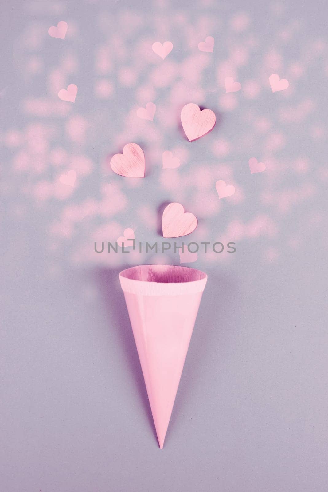 Cone with hearts, birthday and valentines day greeting card, spreading love, positive emotion, flat lay