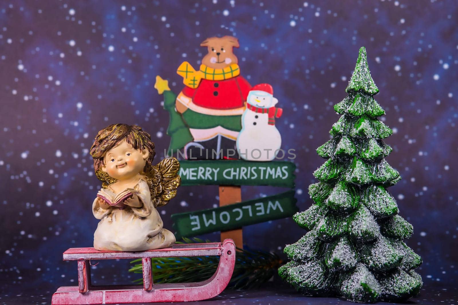 merry christmas board with angel, Santa Claus and christmas tree