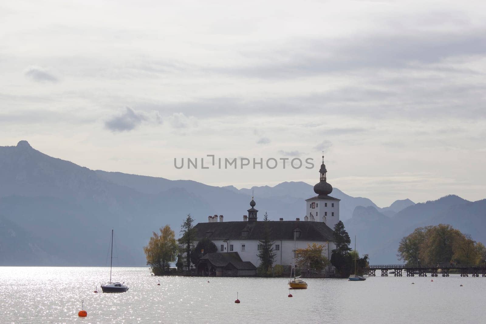 Castle Orth on lake Traunsee, Austria. Castle Orth is an Austrian castle founded around year 1080 in Gmunden, Austria