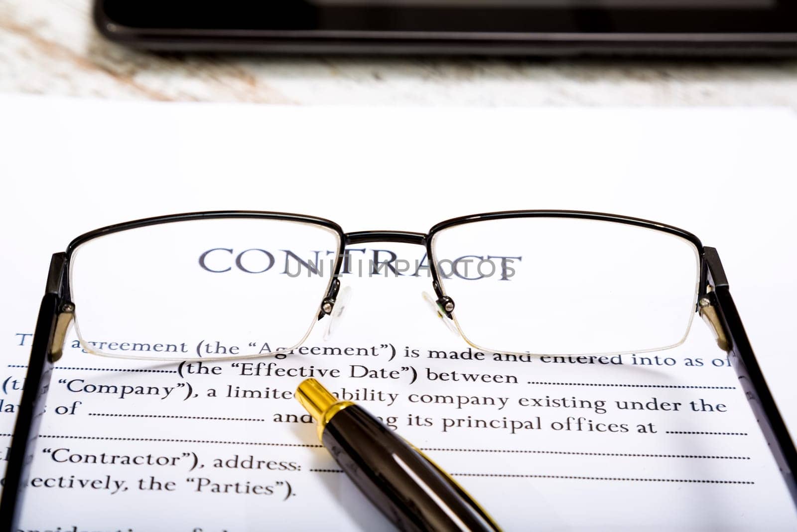 Reading a Contract before signing.
