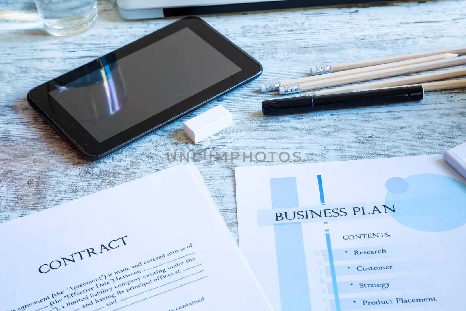 Analyzing a Contract and a Business Plan.