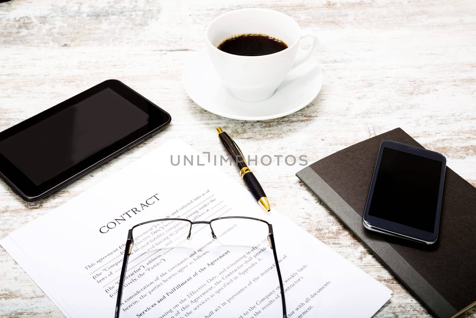 Reading a Contract before signing.