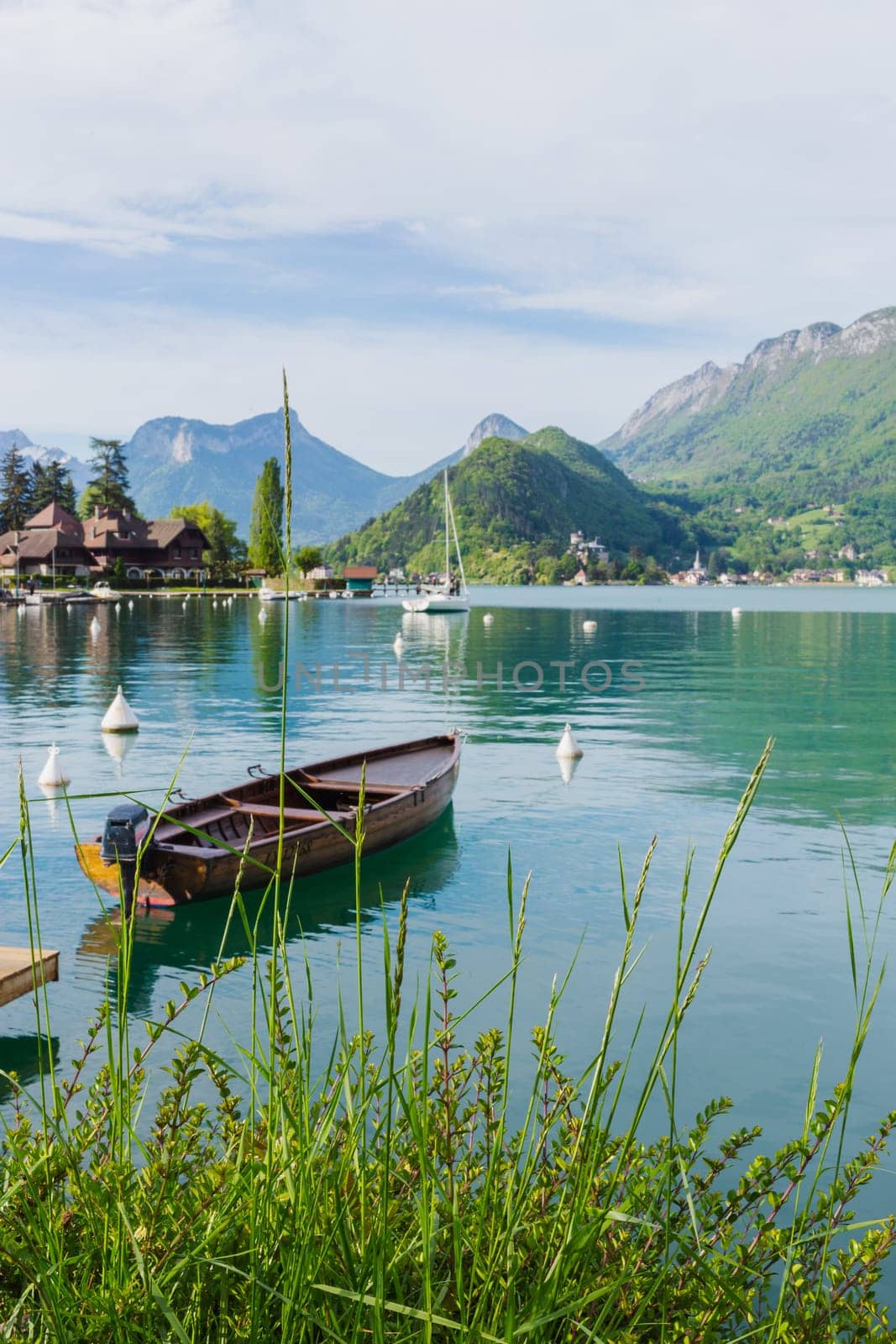 Wooden boat on the Lake of Annecy in the french Alps