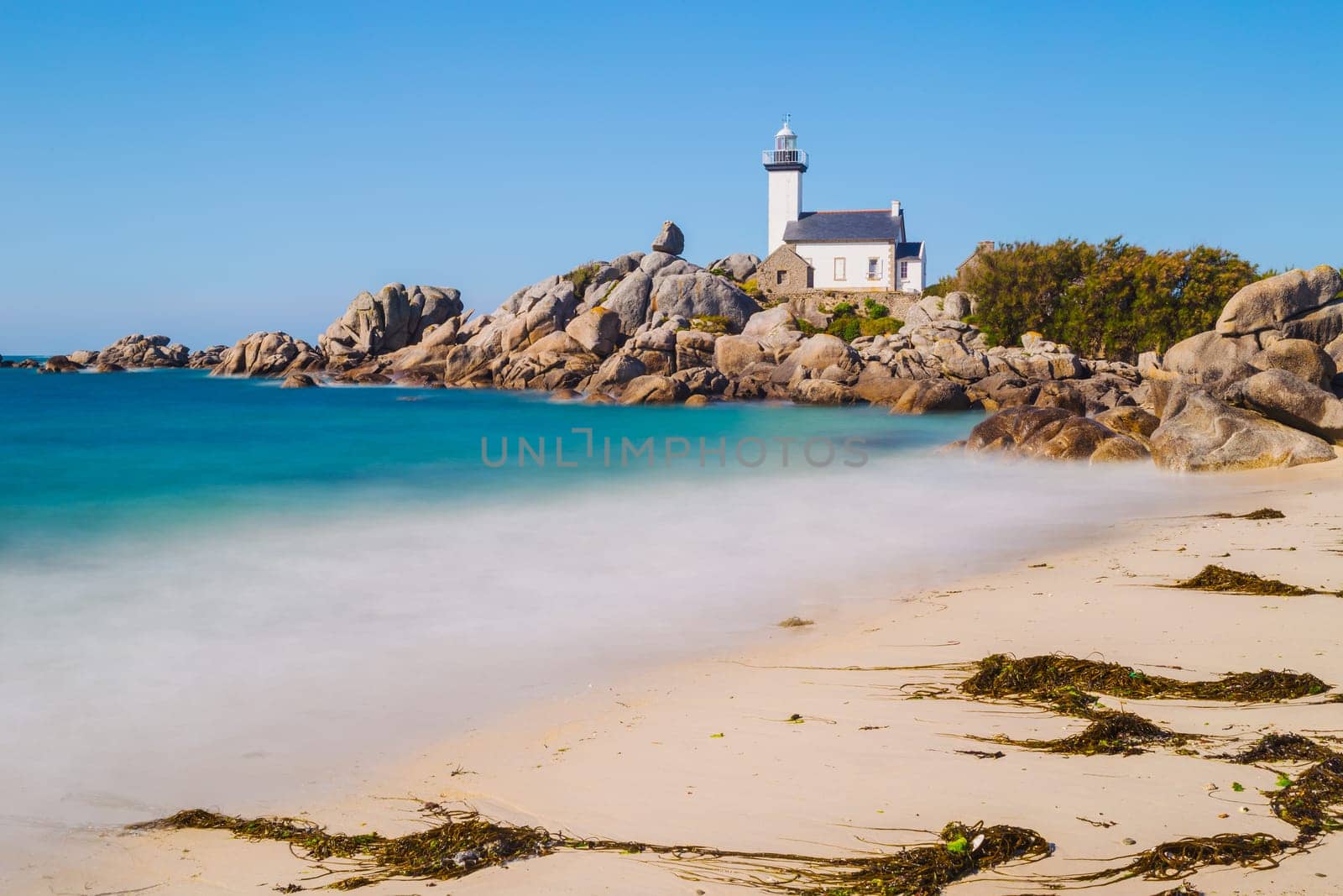Pontusval lighthouse from the coast in Kerlouan, northern Brittany, France