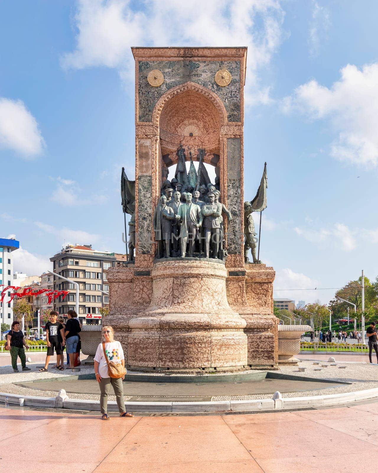 Istanbul, Turkey - September 2, 2022: Republic Monument, or Cumhuriyet Aniti Statue, at Taksim Square, in a sunny summer day