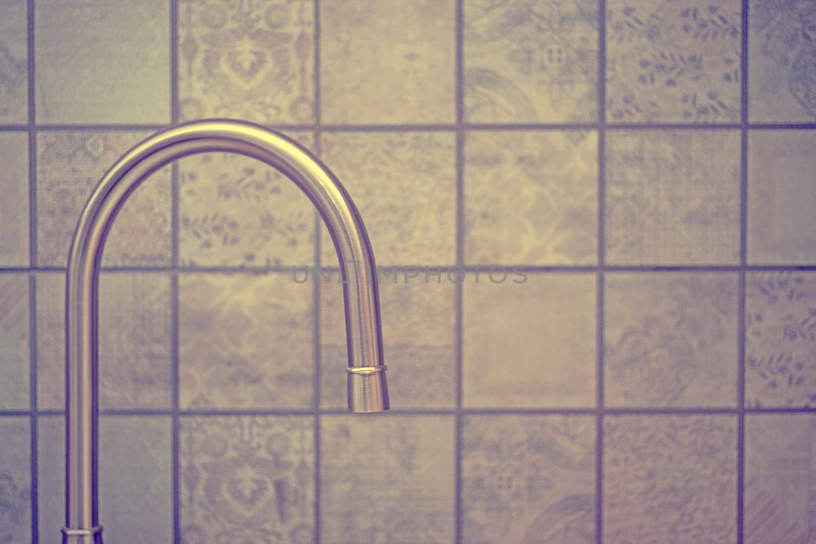 Water tap faucet in the kitchen for background