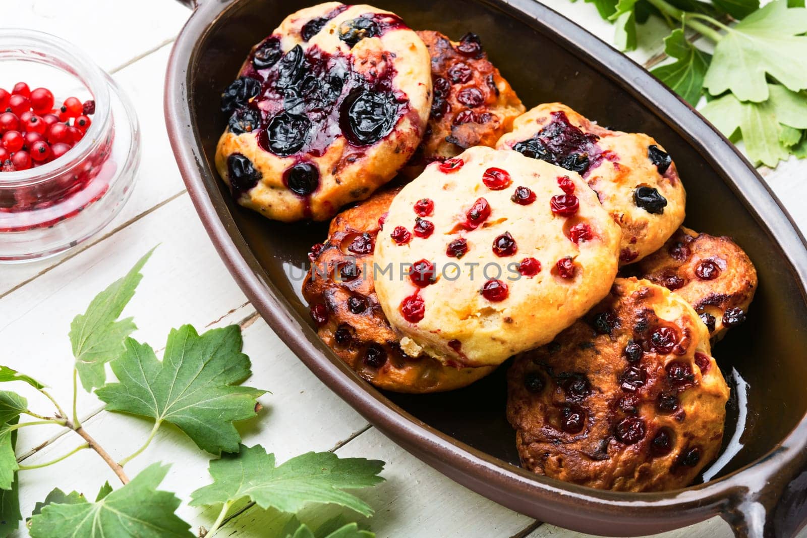 Appetizing cookies biscuit with red currants. Cookie with fruit berries