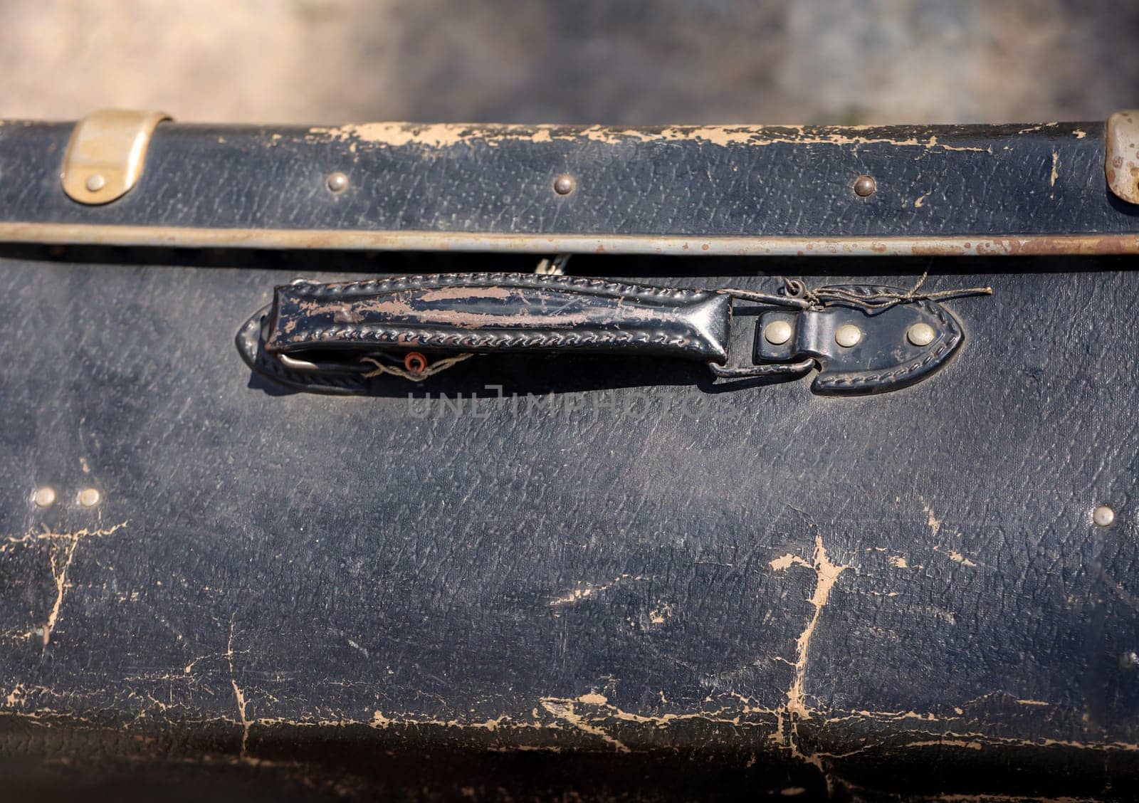 Details of an old suitcase as it was used 50 years ago.