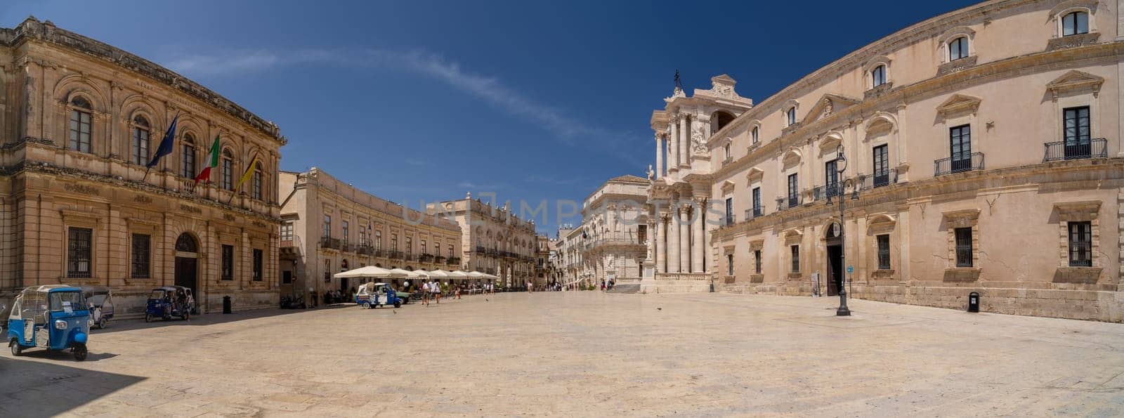 Syracuse, Italy - 08 18 2020: The white cathedral square in Ortigia island in Syracuse, Italy.