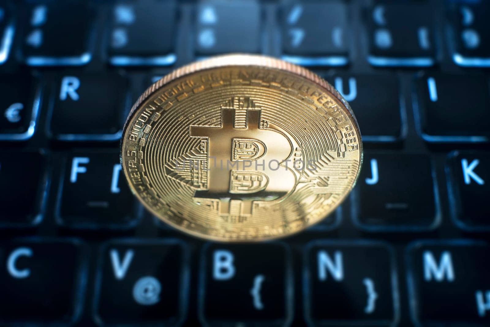 Bitcoin on computer trading background. Virtual cryptocurrency concept.