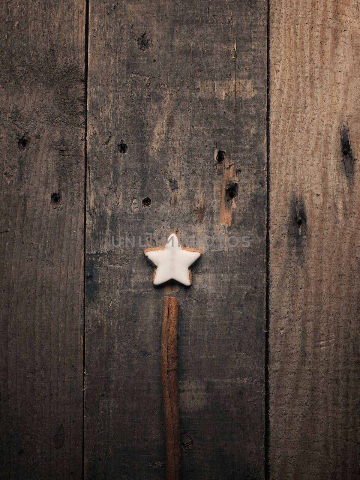 Cinnamon star cookie on a wooden background, Christmas bakery or seasonal pastry