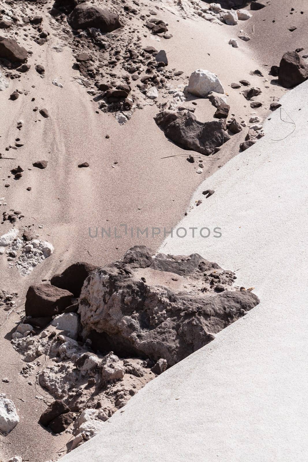 Sands mixing cream,grey,brown,colors joining line on beach embankment background.