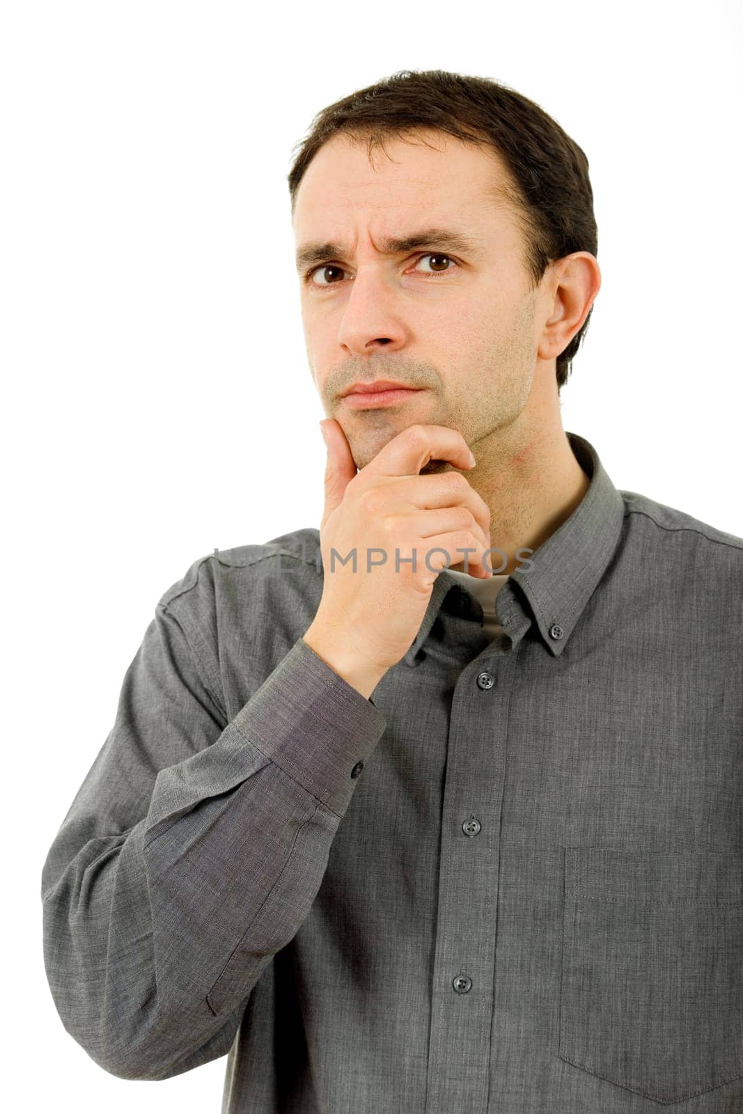 studio picture of a pensive young man, isolated on white