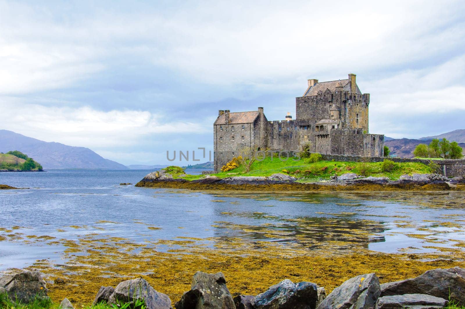 Famous Eilean Donan Castle in Scotland, UK. Situated on a small isle at the meeting point of three sea lochs - Loch Long, Loch Duich and Loch Alsh, is one of the most iconic images of Scotland.
