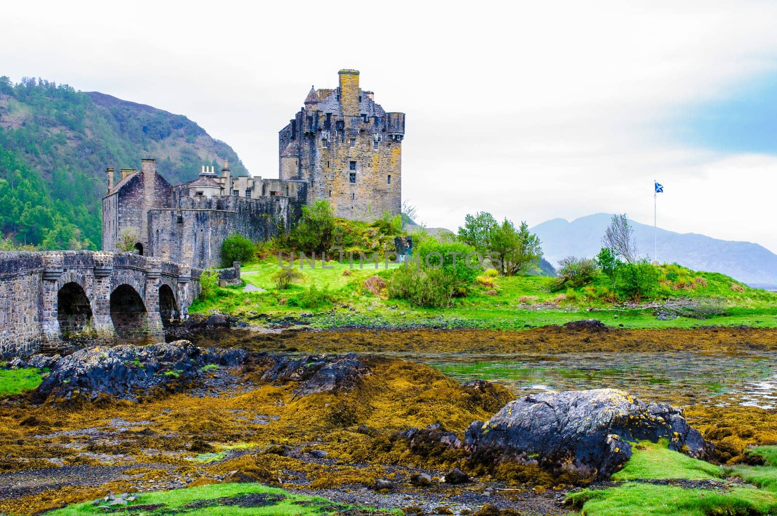 Famous Eilean Donan Castle in Scotland, UK. Situated on a small isle at the meeting point of three sea lochs - Loch Long, Loch Duich and Loch Alsh, is one of the most iconic images of Scotland.