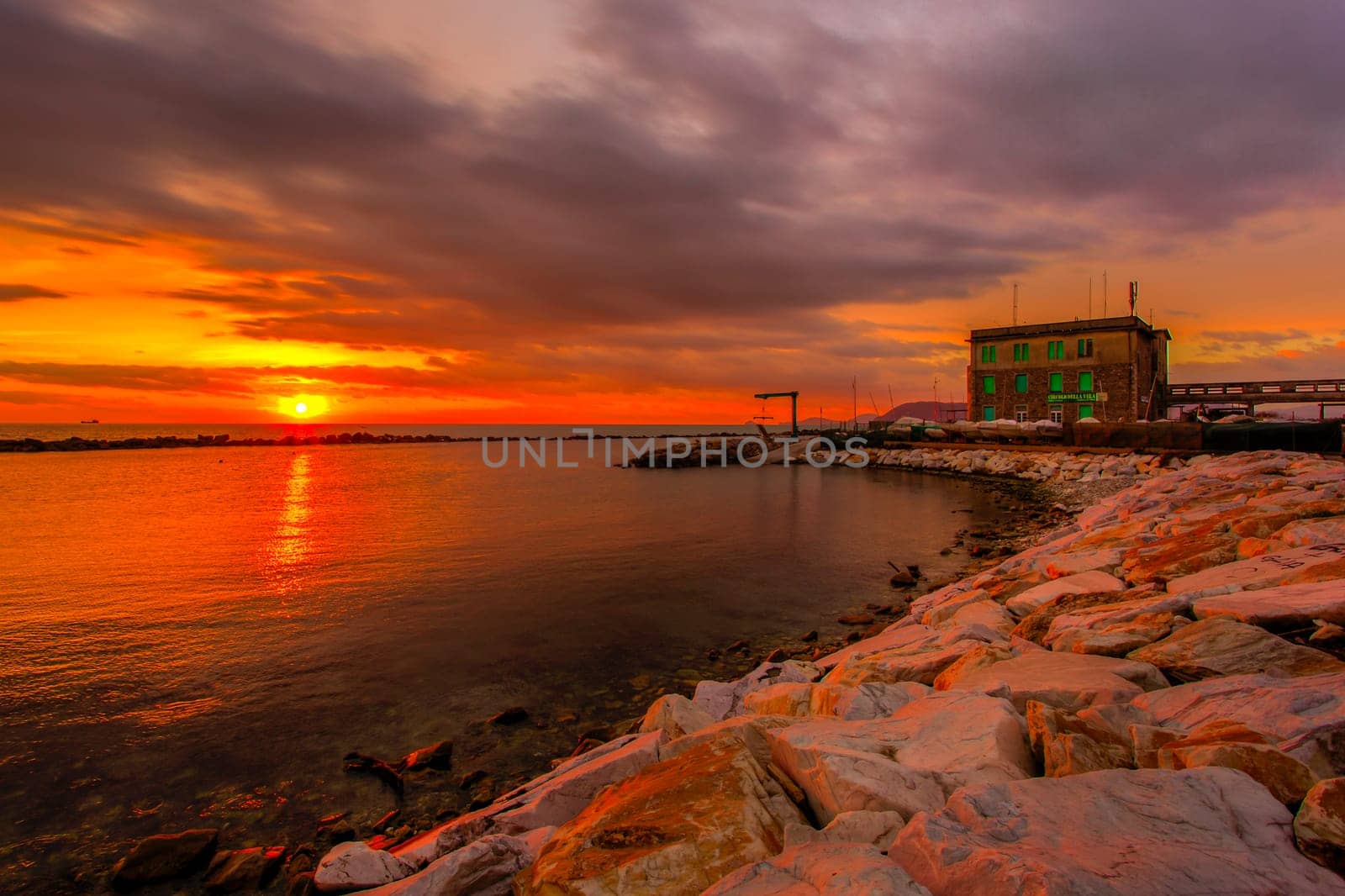 View of the sunset in Marina di Massa using the technique hdr