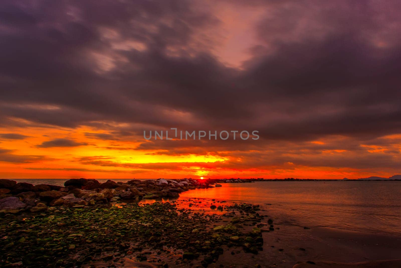 View of the sunset in Marina di Massa using the technique hdr