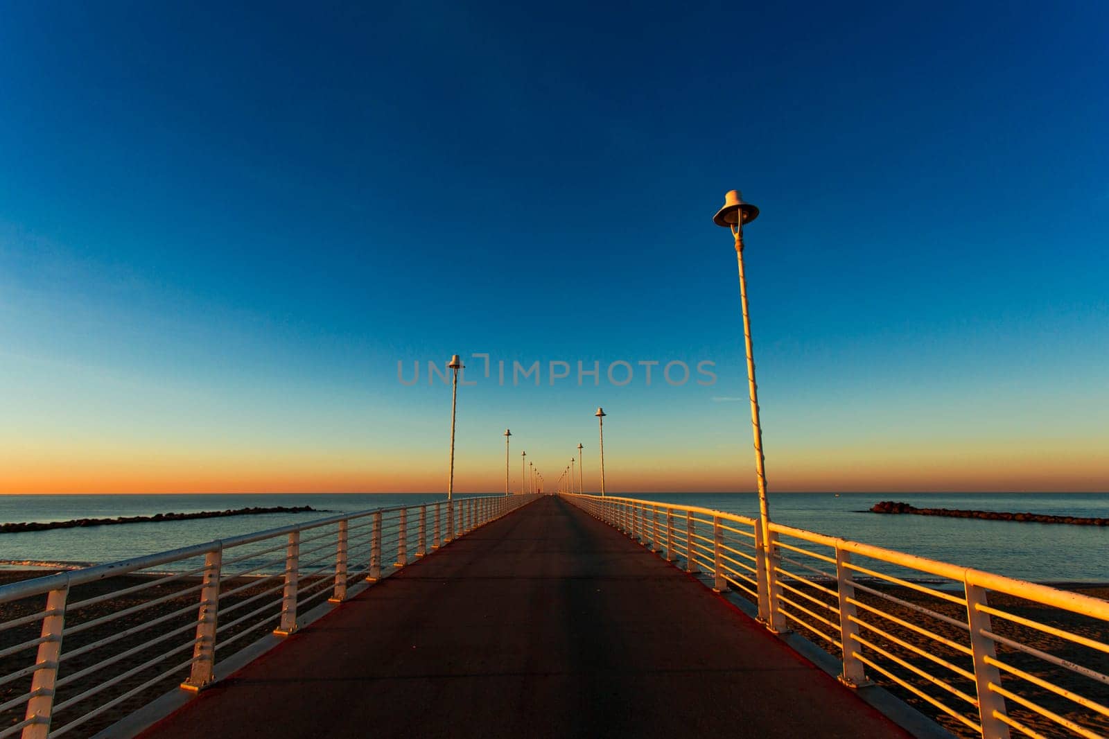 Special vision from the jetty of Marina di Massa to dawn of the new year