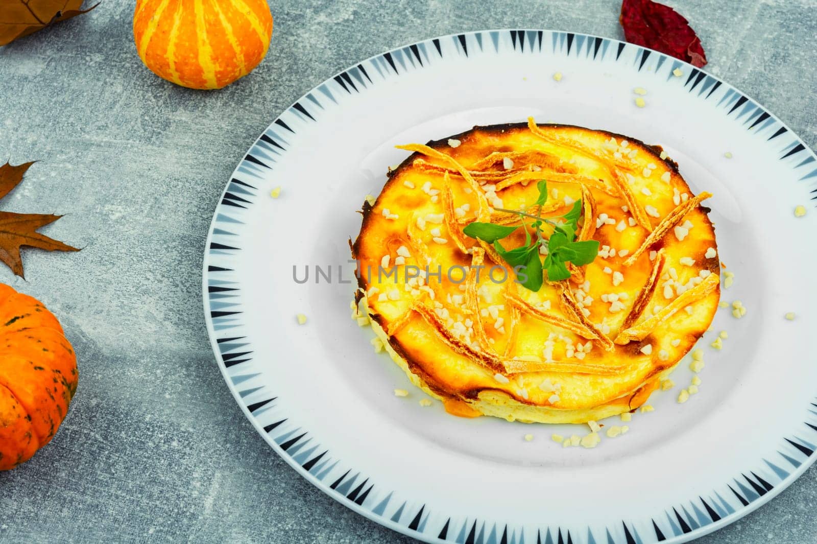 Baked casserole with pumpkin and cottage cheese. Autumn baking with pumpkin.