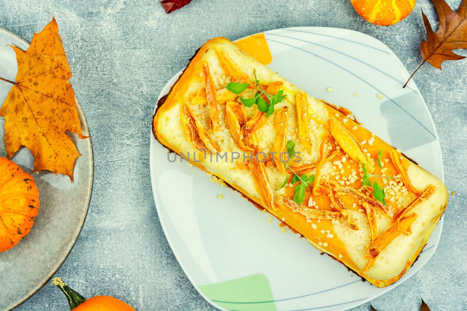 Baked casserole with pumpkin and cottage cheese. Autumn baking with pumpkin.