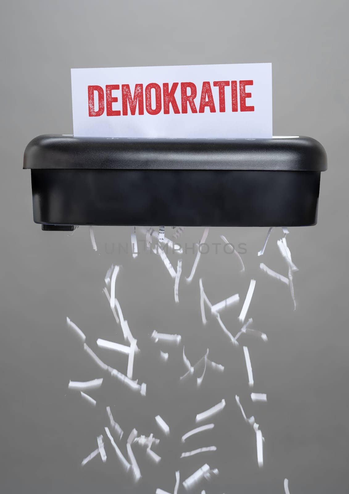 A shredder destroying a document - Democracy in german - Demokratie
