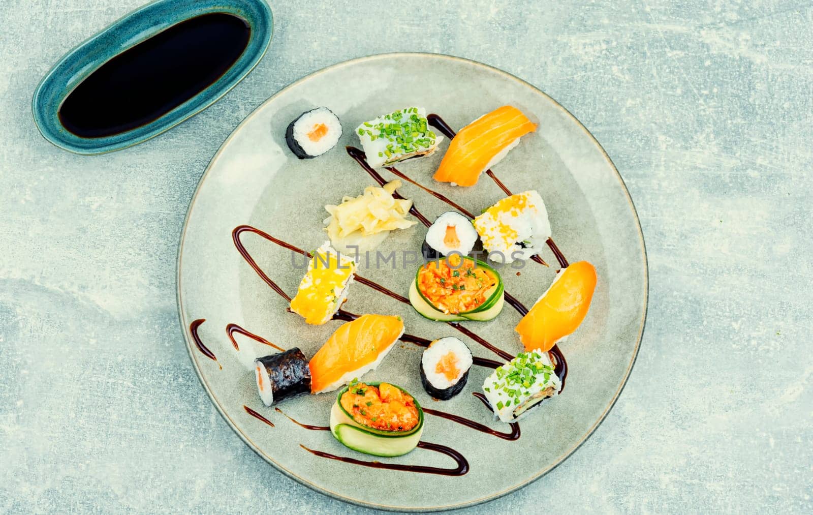 Appetizing sushi rolls on the plate. Sushi menu.