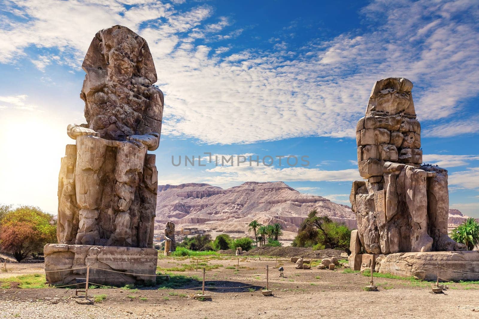 The Colossi of Memnon or statues of the Pharaoh Amenhotep, Luxor, Egypt.