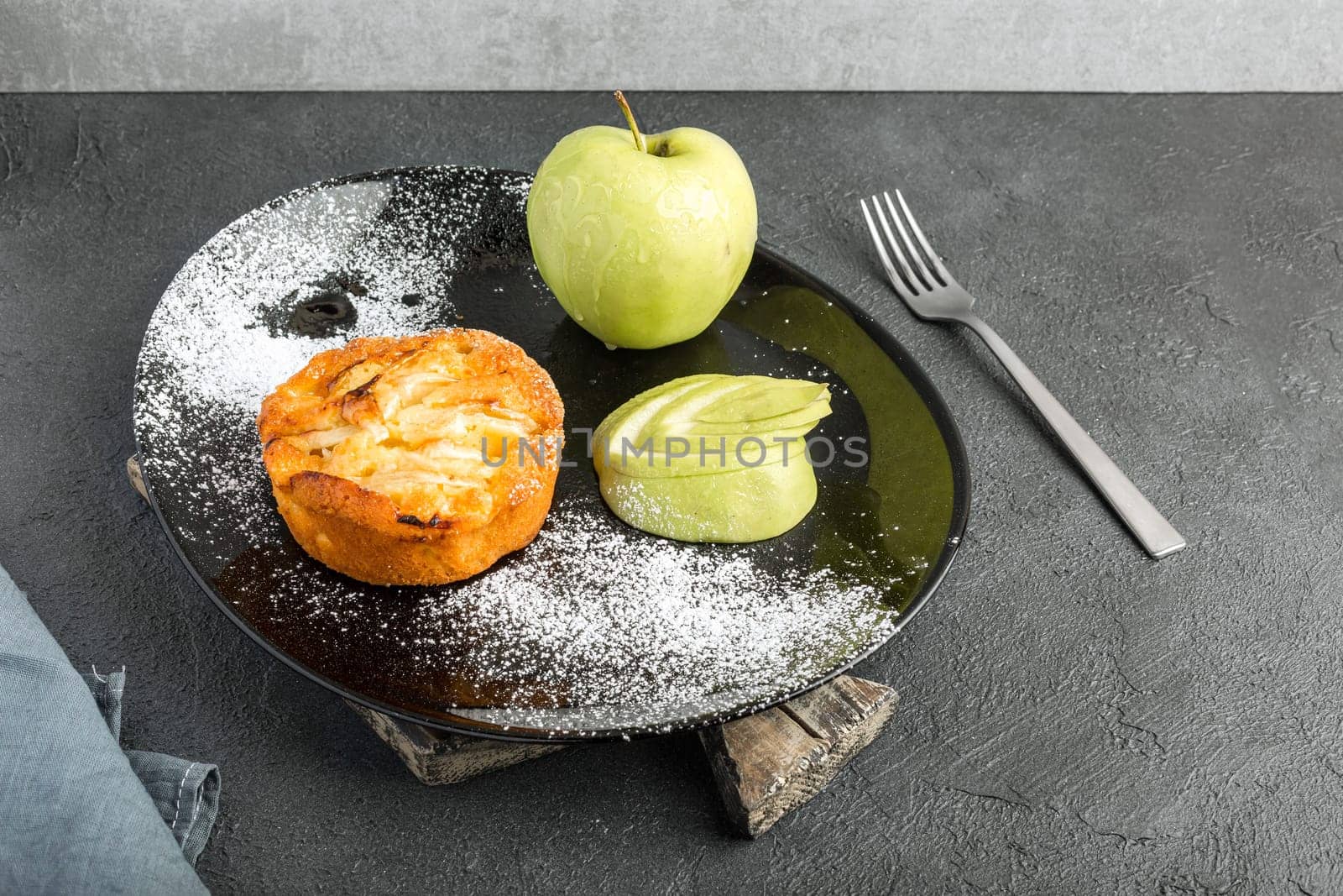 A sweet and fragrant apple pie on the table with copyspace for text.