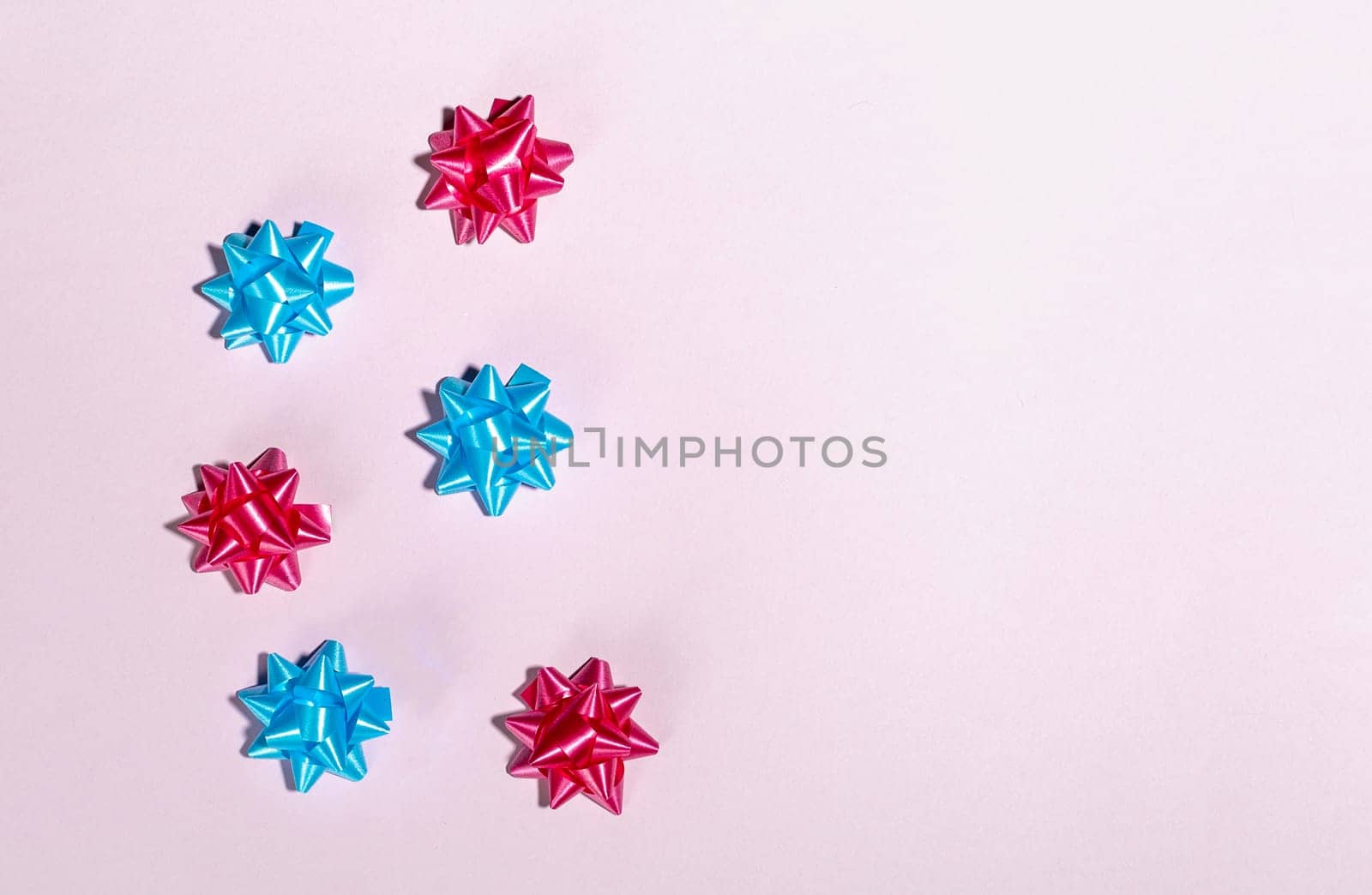 Wrapping Ribbons And Bows For Valentine'S Day, Christmas or Birthday on light pink background