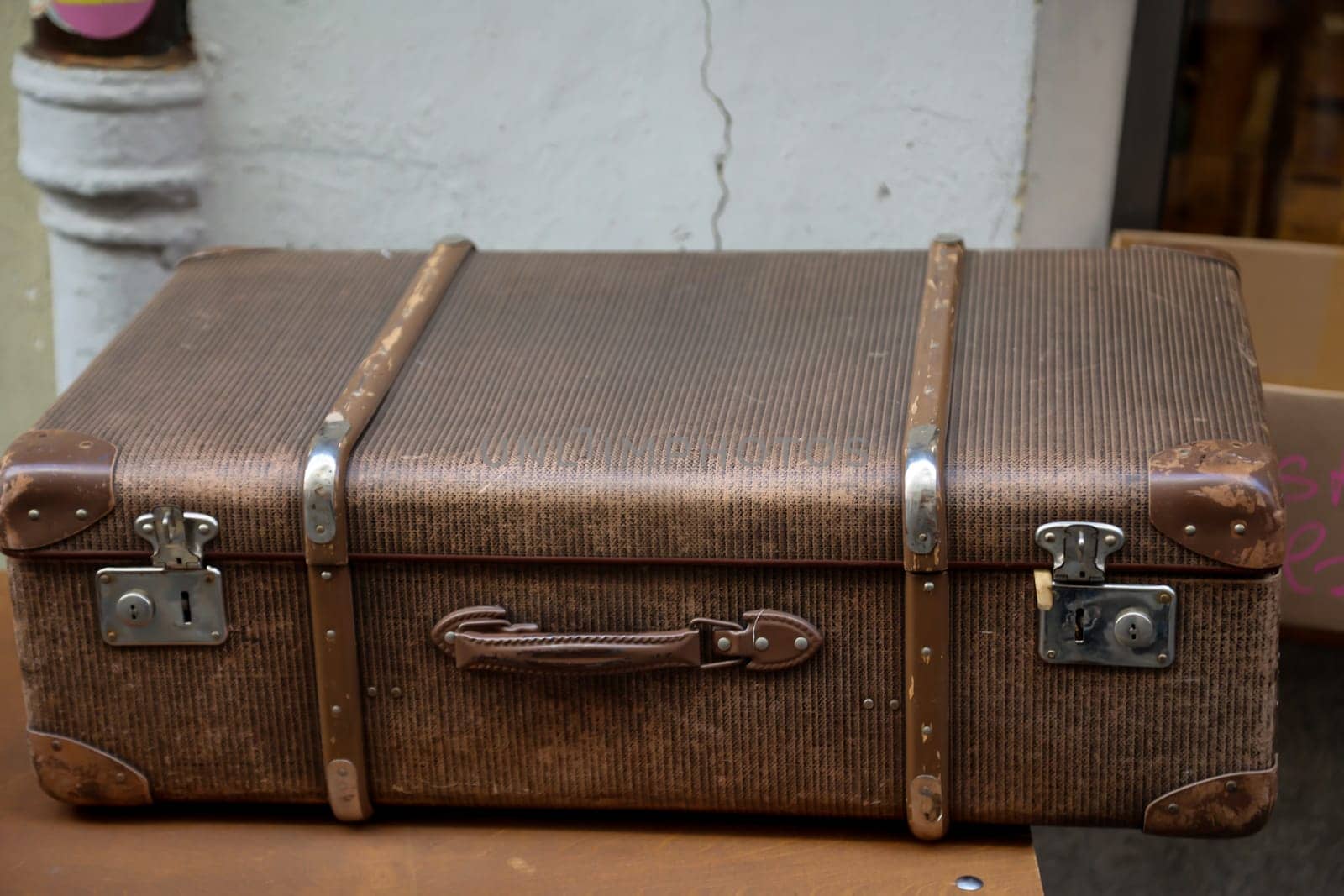 Details of an old suitcase as it was used 50 years ago.