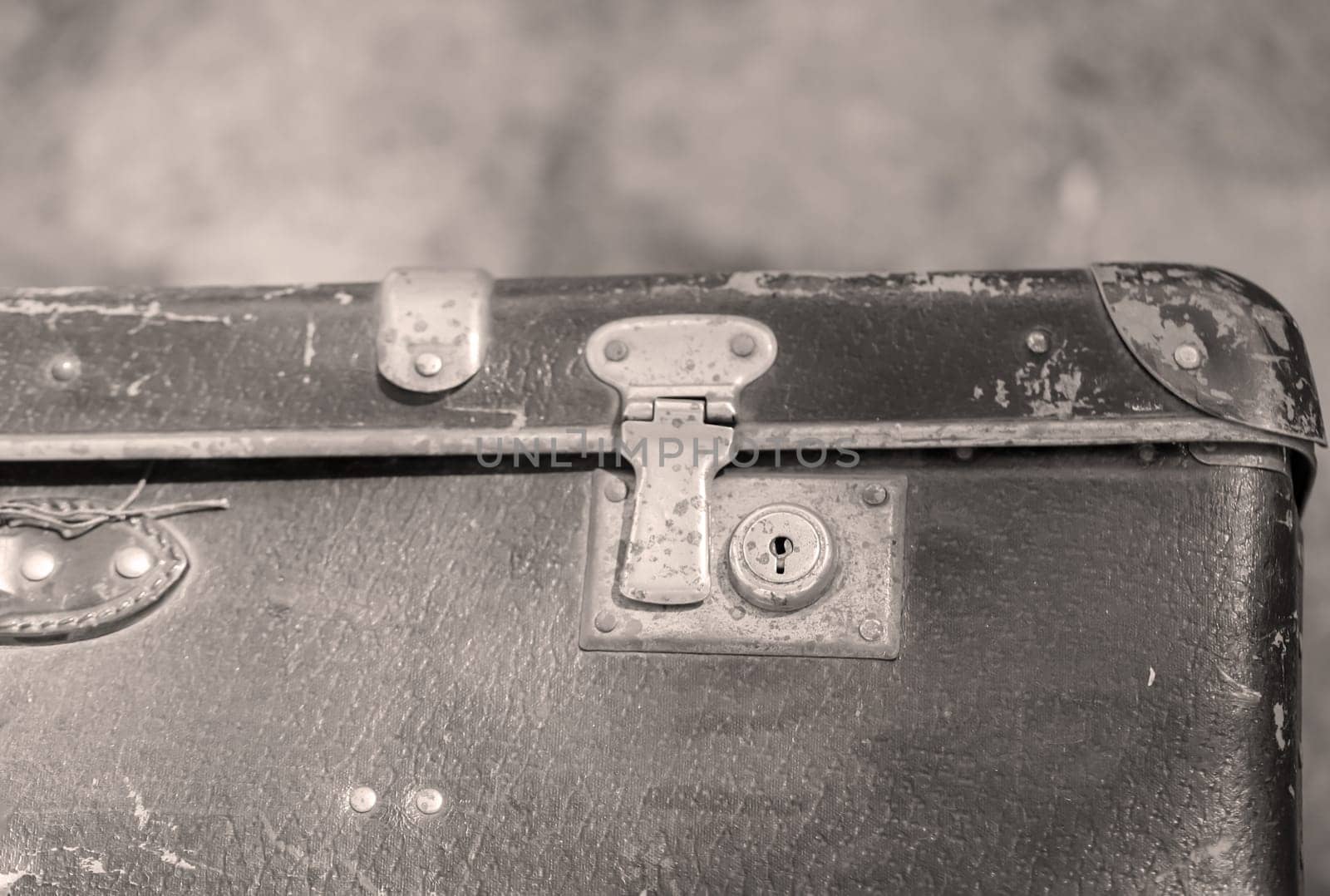 Details of an old suitcase as it was used 50 years ago.