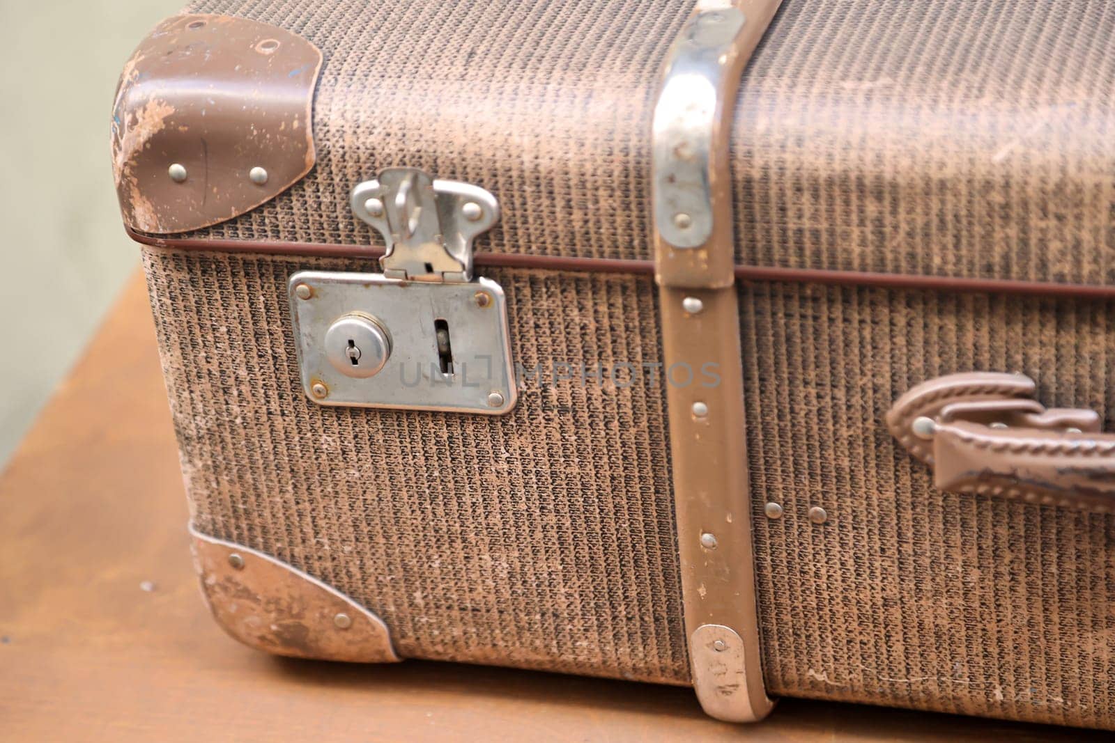 Details of an old suitcase as it was used 50 years ago.