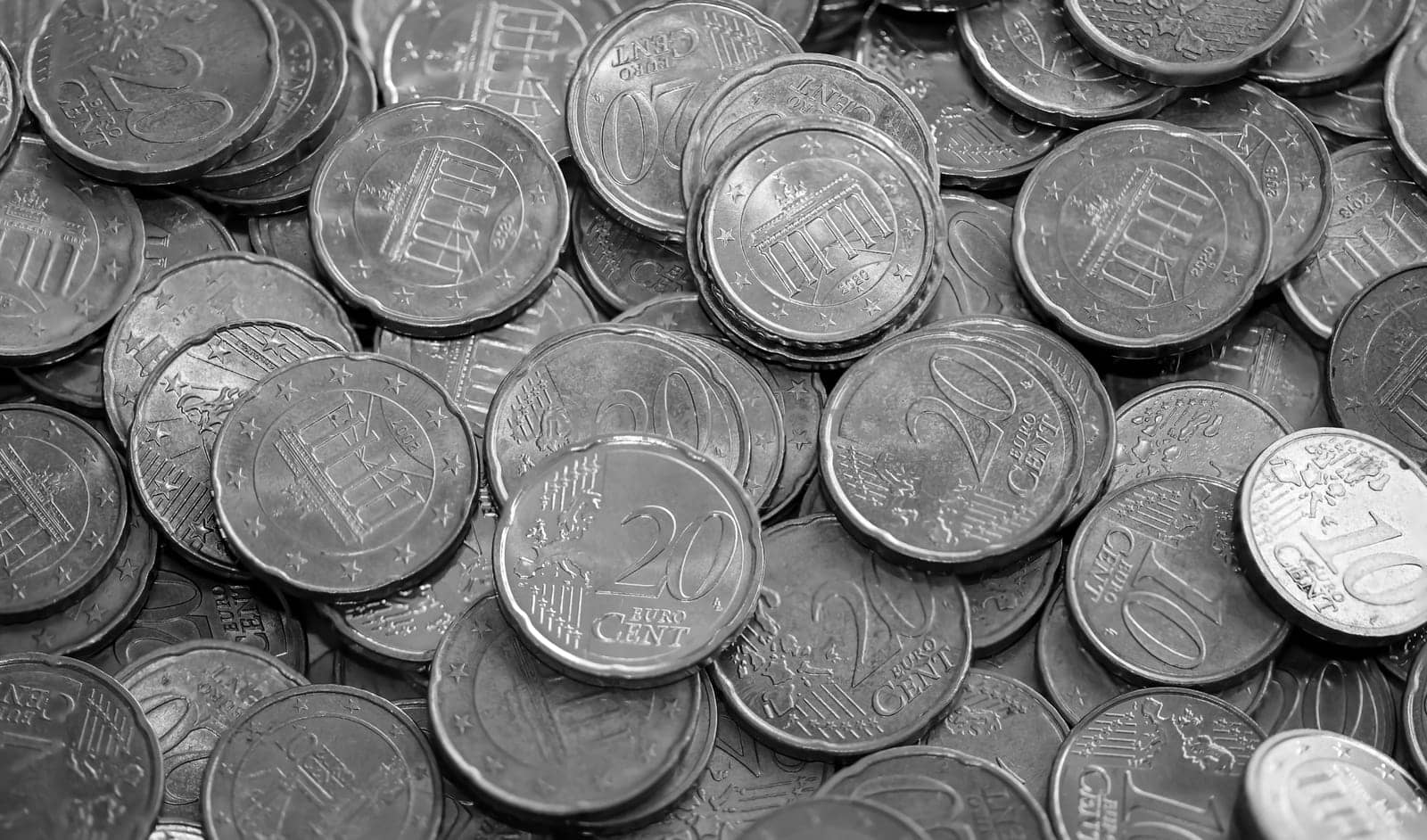 Many coins, euro currency lying in a heap.
