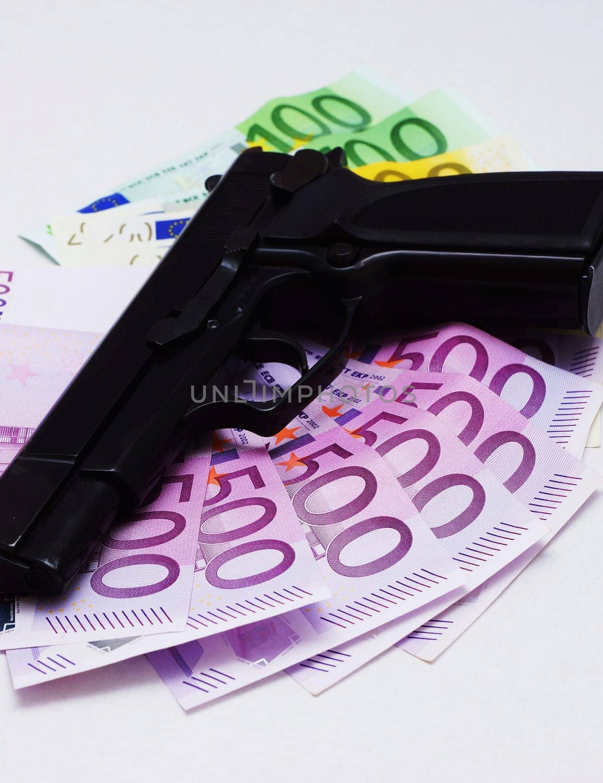 Pistol and money