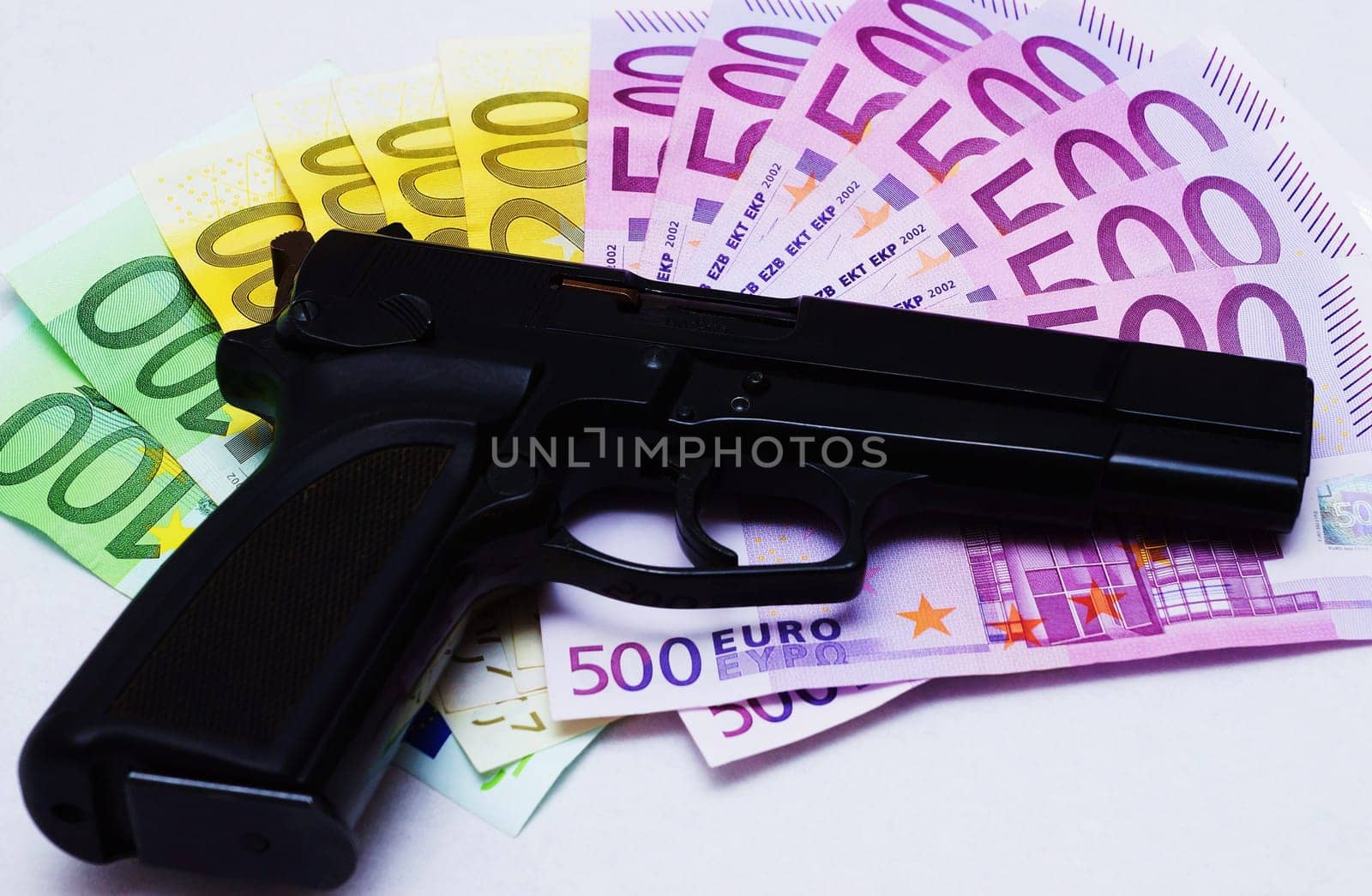 Pistol and money