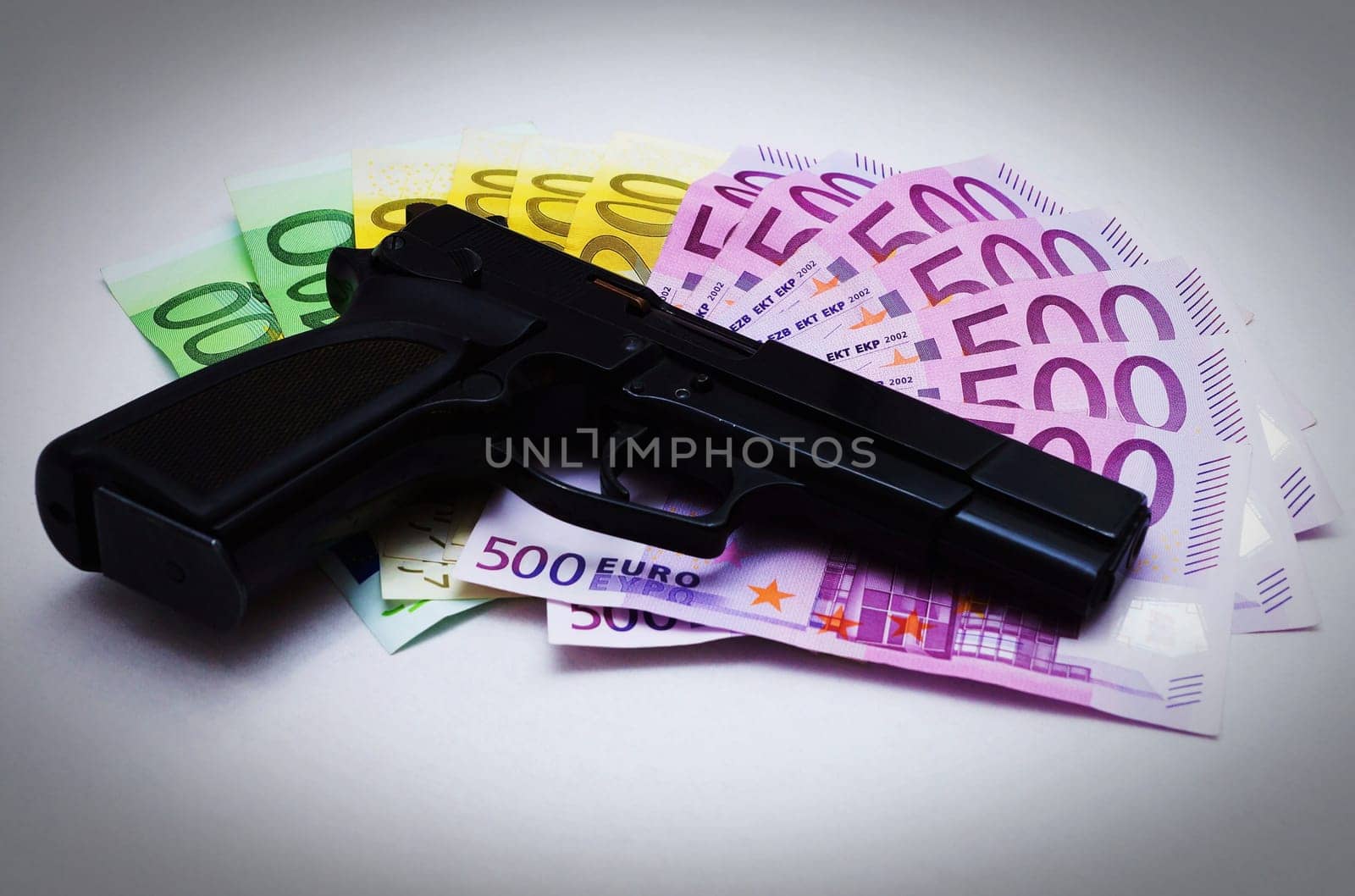 Pistol and money