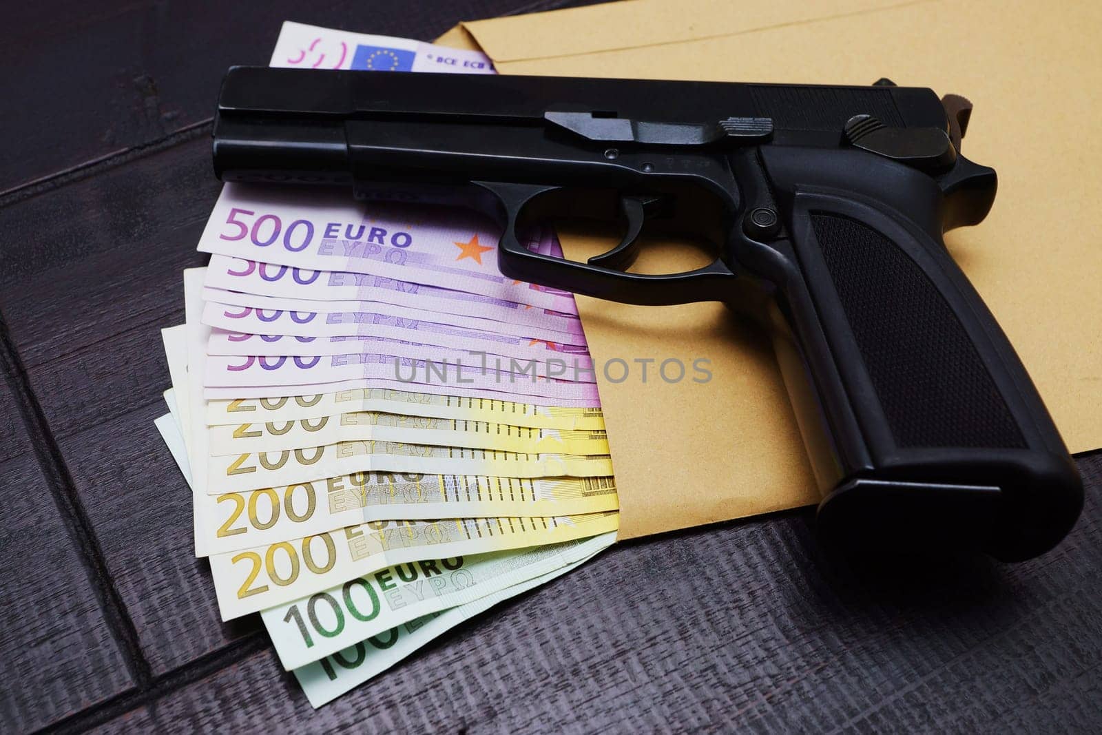 Pistol and money