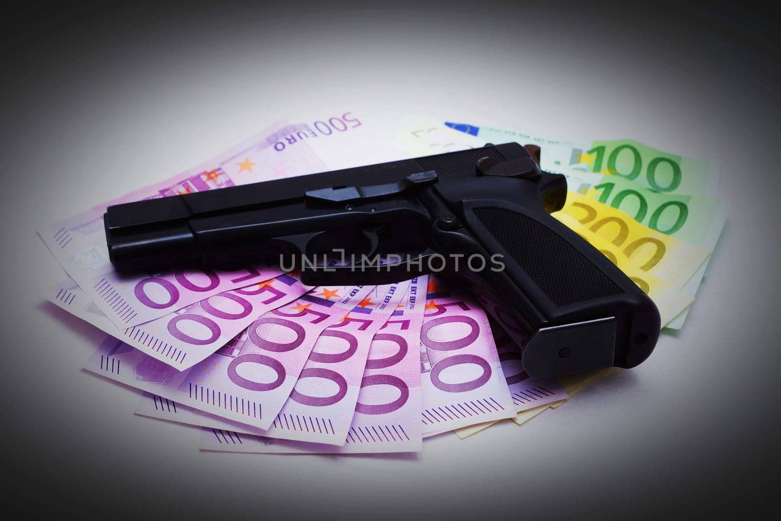 Pistol and money